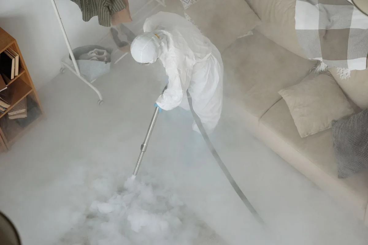 Biohazard cleanup technician in protective equipment, Peyton Forest, Atlanta, GA